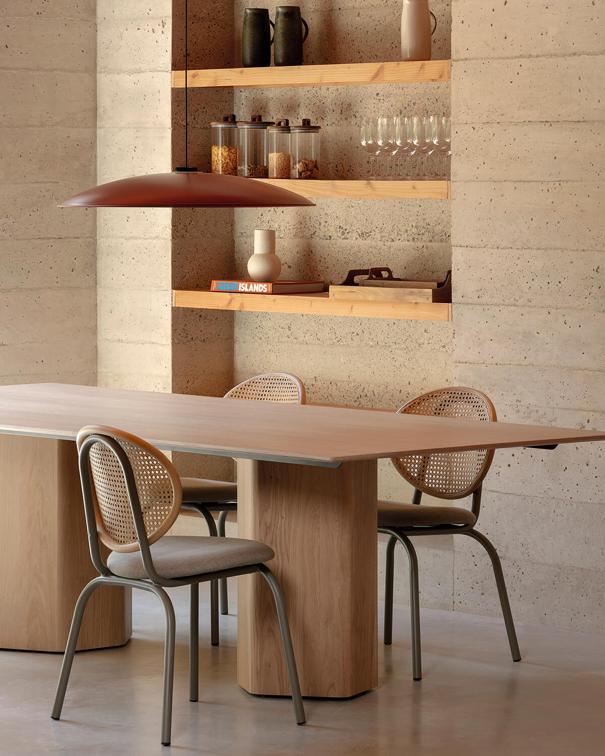 Rattan chairs around a rectangular wooden dining table