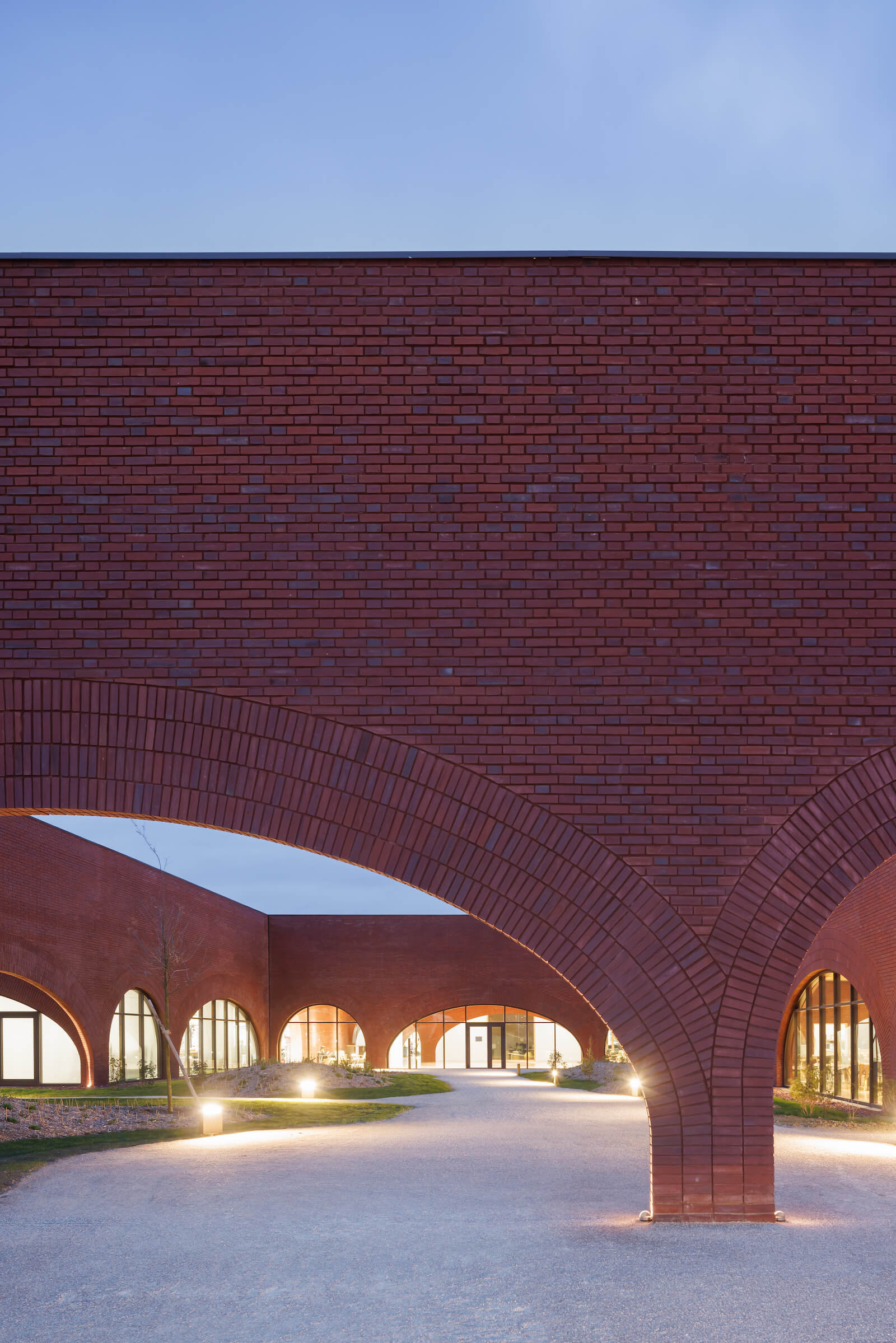 A central courtyard at Lina Ghotmeh's Hermès building is part of the landscape architecture by Belgium's Erik Dhont.