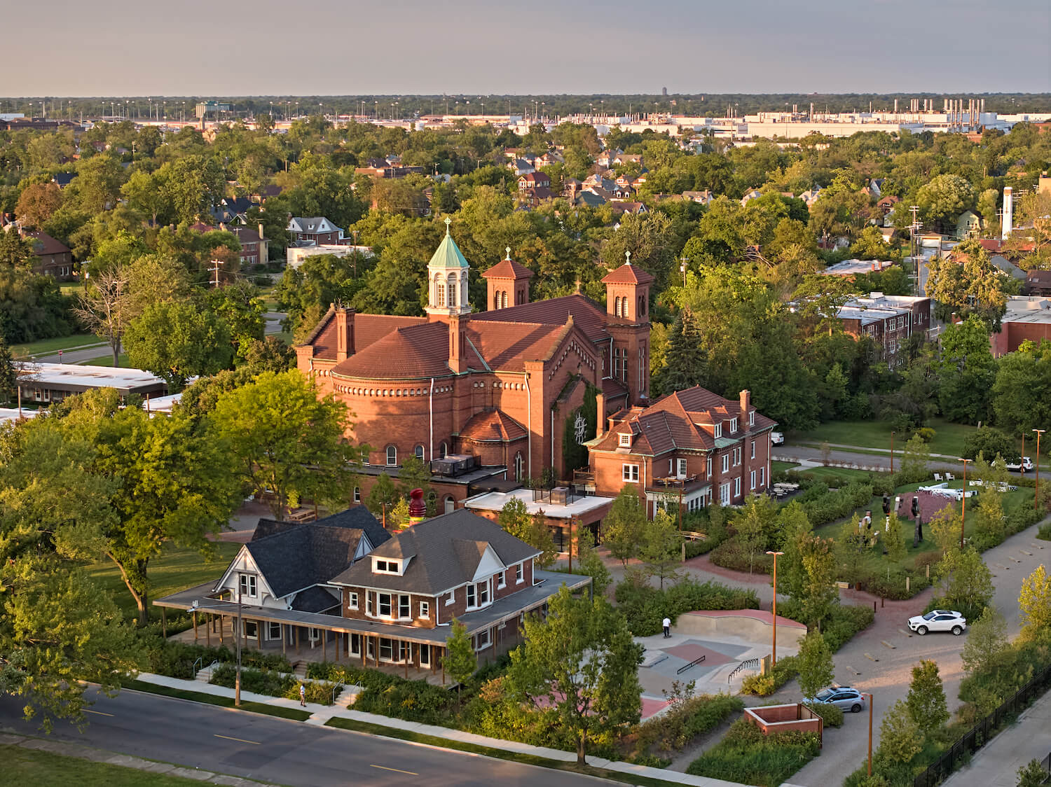 The skatepark alongside BridgeHouse was designed by Tony Hawk and McArthur Binion. Aerial view of main Little Village Detroit campus block.