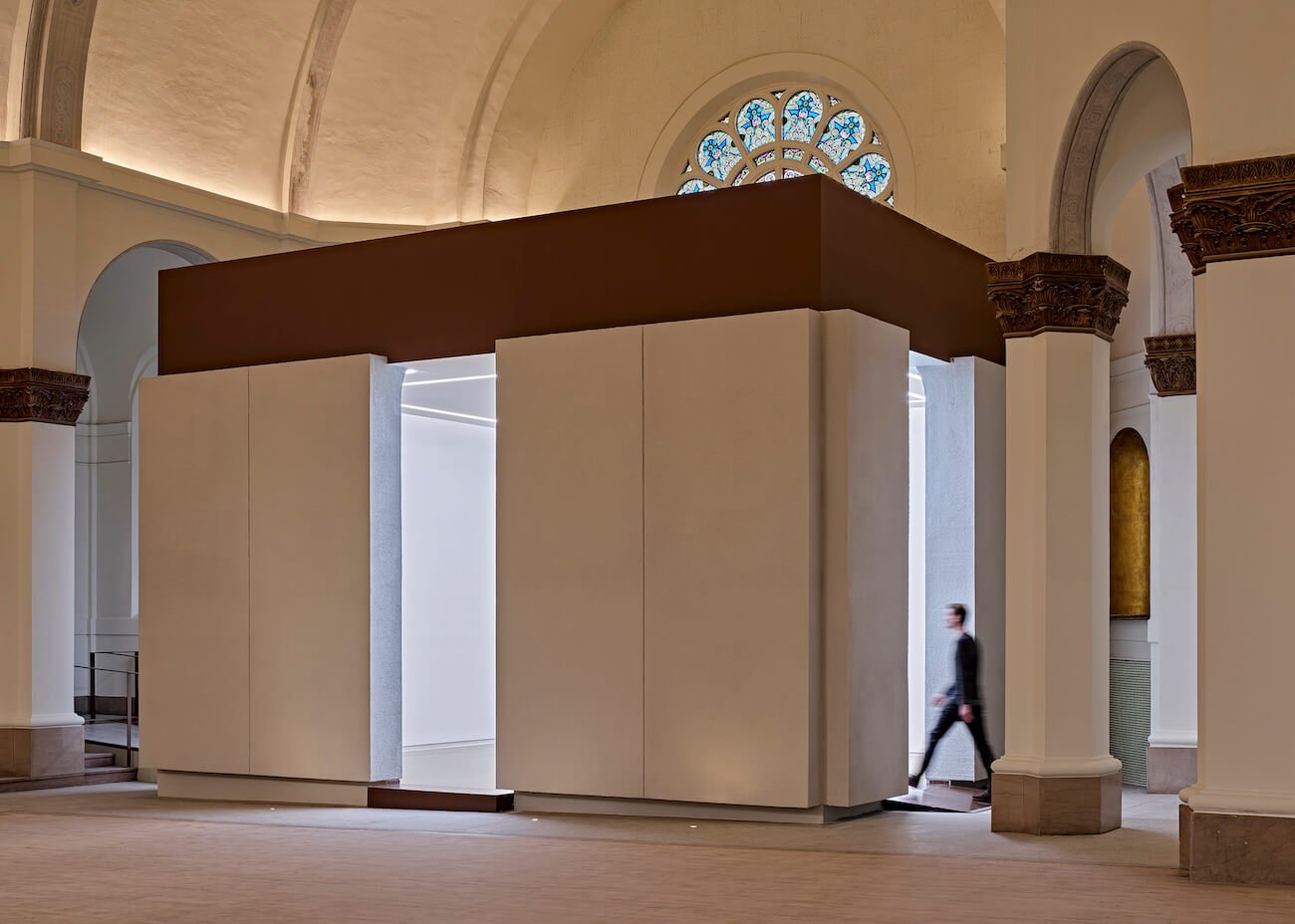 A new gallery space is inserted into the north transept.