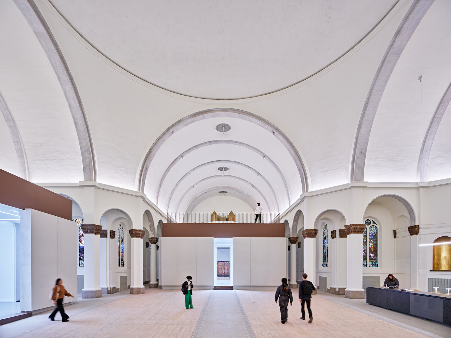 Peterson Rich Office carefully inserted a pair of large volumes into the church interior, deftly respecting the older building's textures and datum lines.