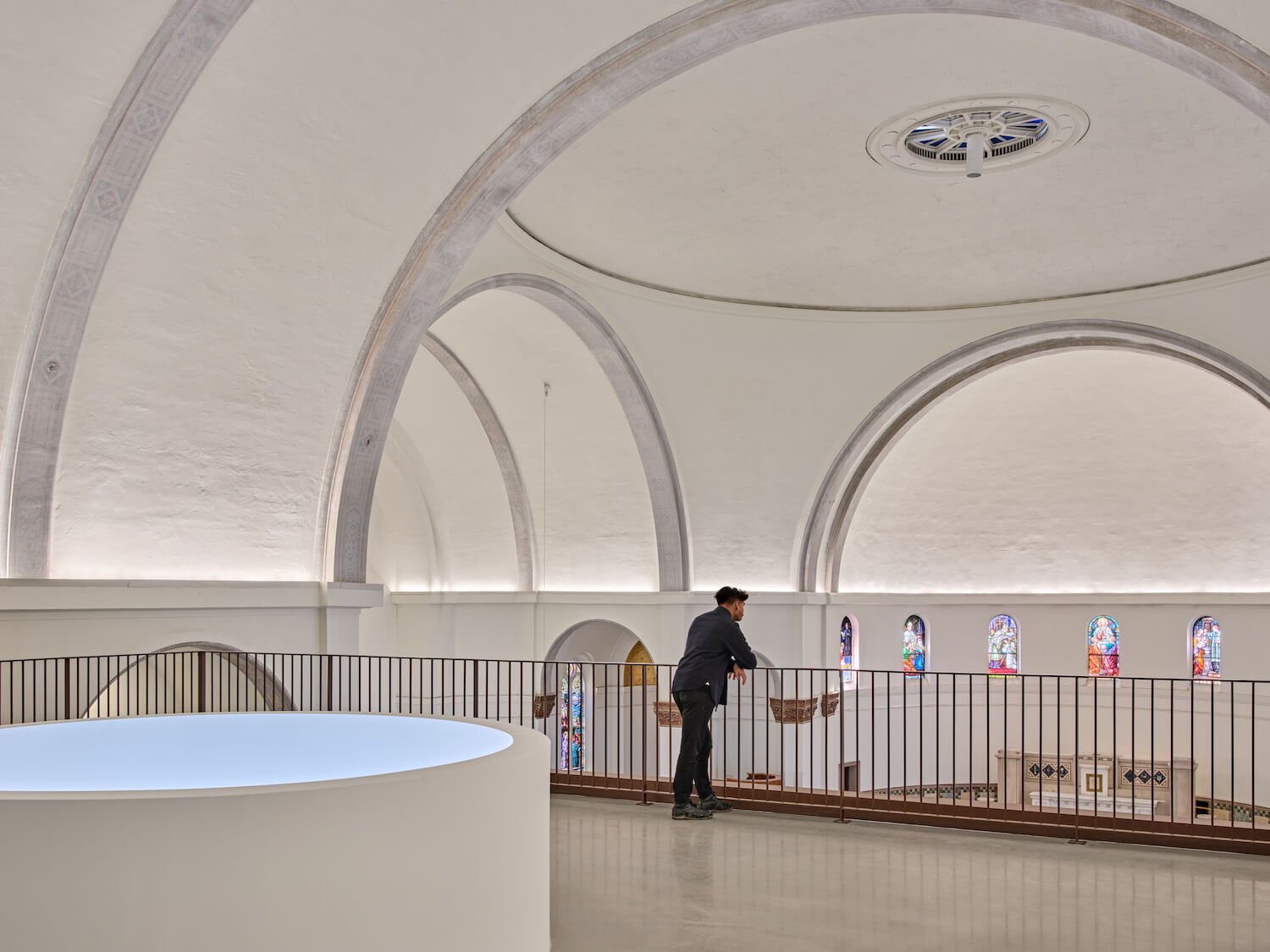 Above the entry pavilion, visitors can gaze down the gallery oculus and get up close with the historic church interiors.