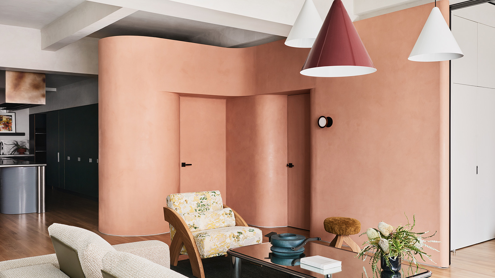 May/June 2024 issue: Loft with grapefruit pink curved wall