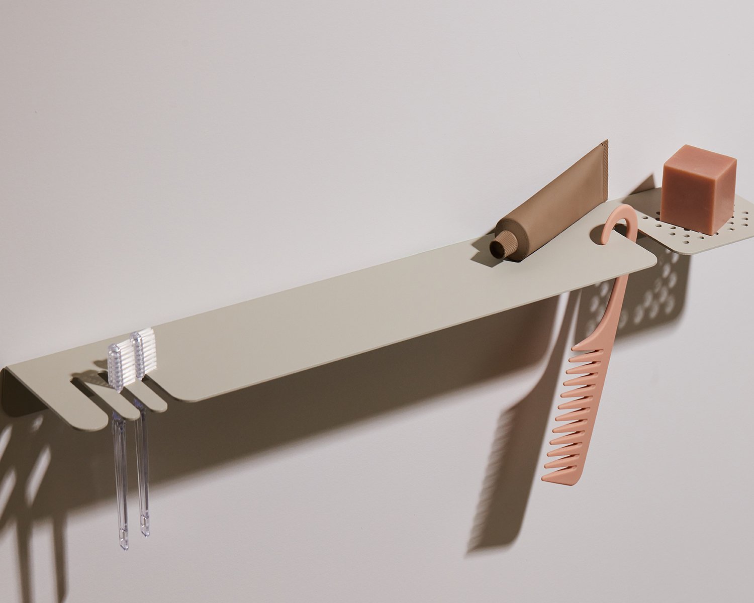 Natalie Bradburn's toothbrush shelf comes in long and short sizes=