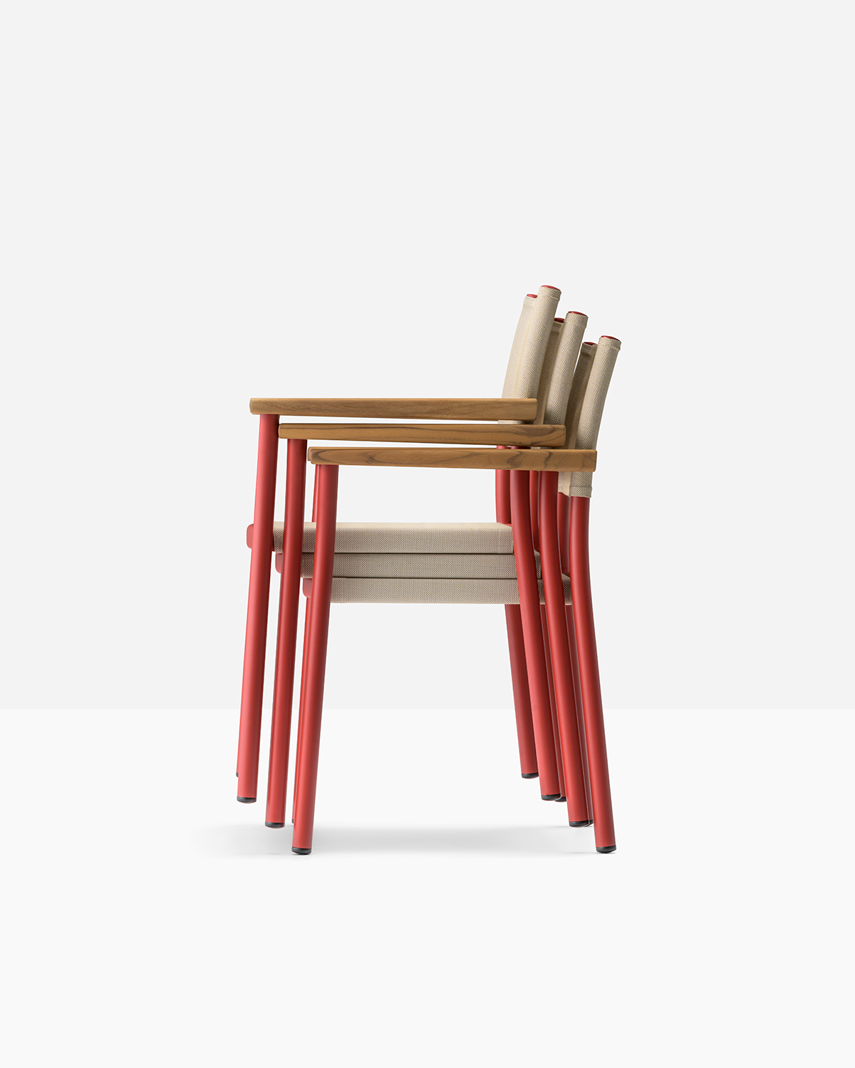 Stacked Guinea chairs by Pedrali