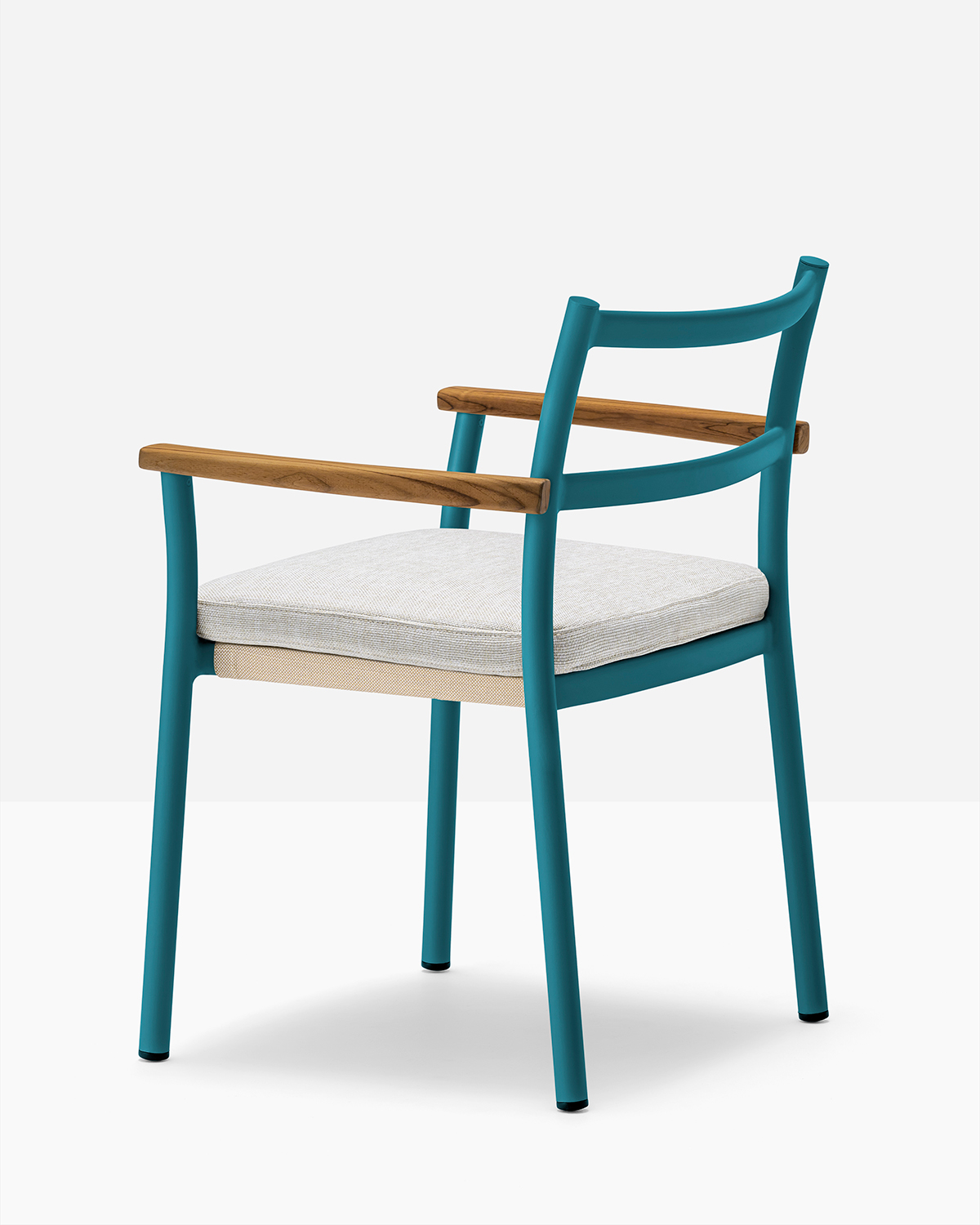 Teal aluminum chair with teak armrests and white cushions