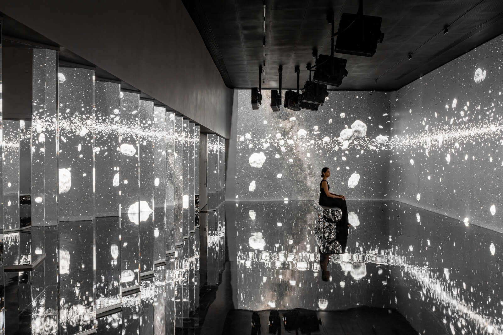 The mirror wall at Sanjay Puri's Aatma Manthan Museum transforms into an immersive setting with a cosmos display