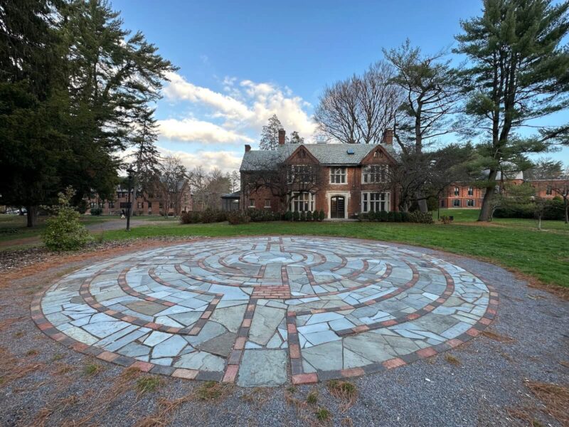 Exterior shot of Vassar multi-faith centre with labyrinth in foreground