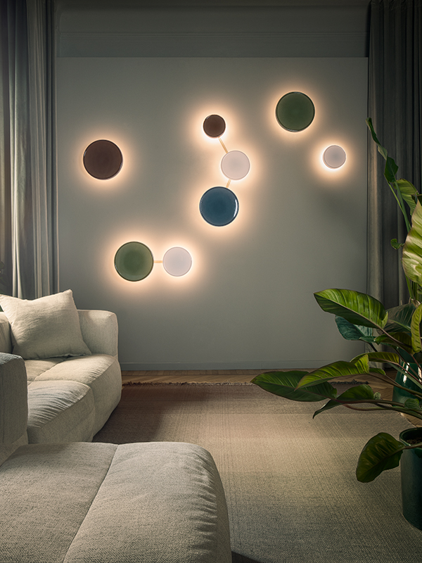 Caramel wall lights by Marset